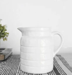 White Ceramic Pitcher With Embossed Lines